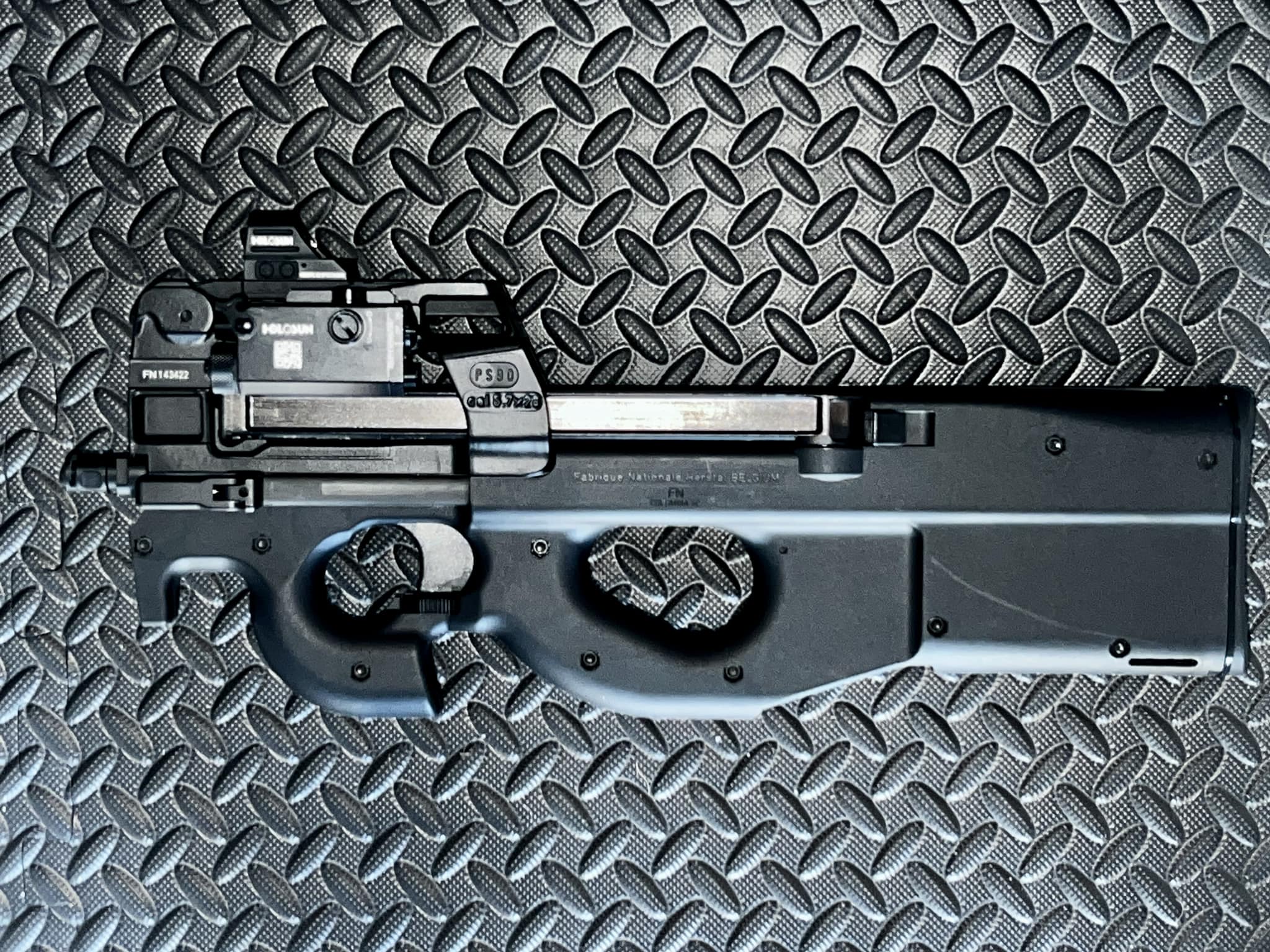 The P90 toy gun with the awesome Red Dot Sight generated from the
