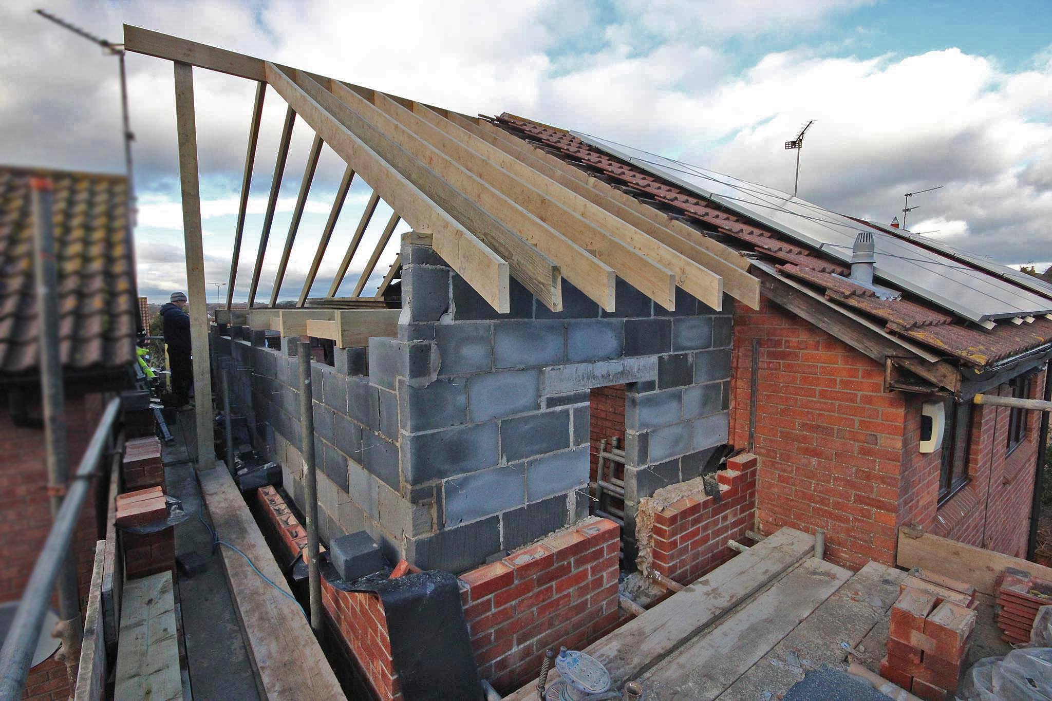 Thomas - Viewed from the back of the house, the rafters have been cut ...