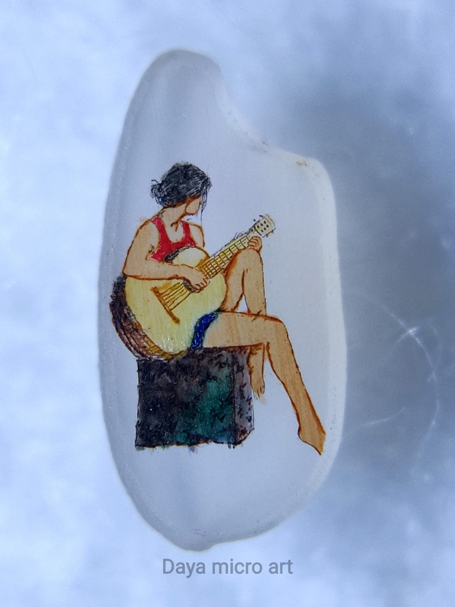 Daya Micro Art - How is this tiny painting on a grain of...