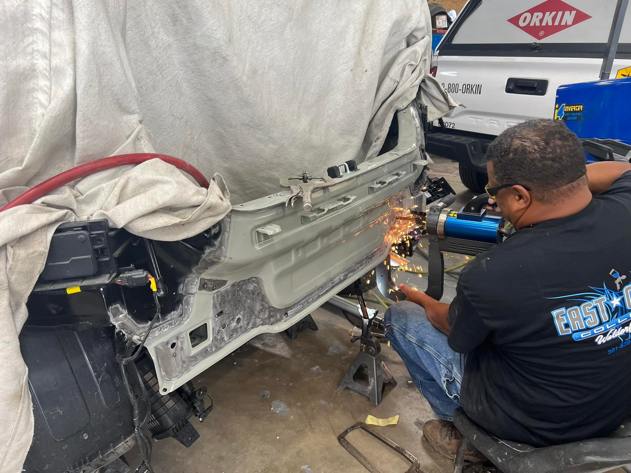 Our Tech Mark is installing a... East Coast Collision LLC