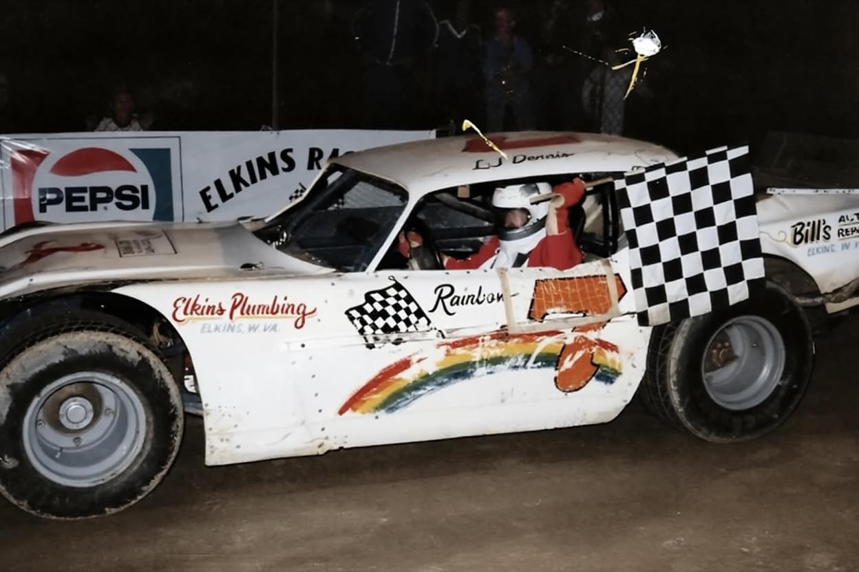 Turn - L.J. Dennis carrying the checkered flag after a 1981 win at ...