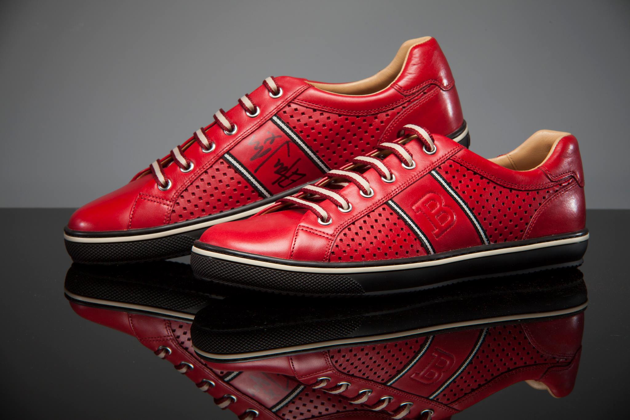 elton-john-elton-has-signed-a-pair-of-bally-trainers-and-a-photo-for