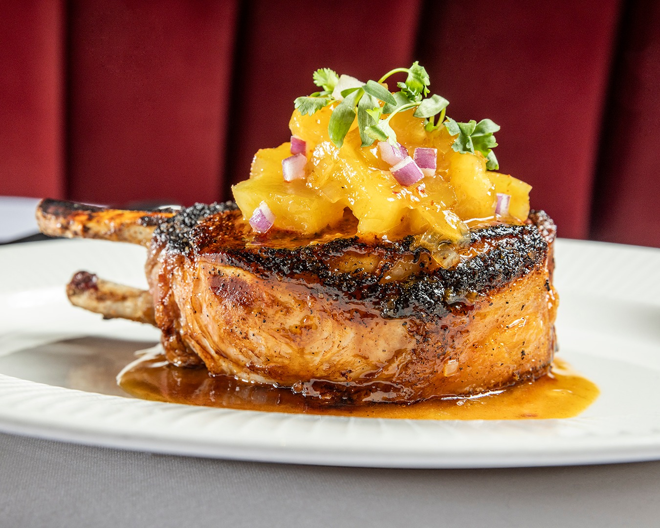 Jeff Ruby's bone-in pork chop with pineapple chutney
