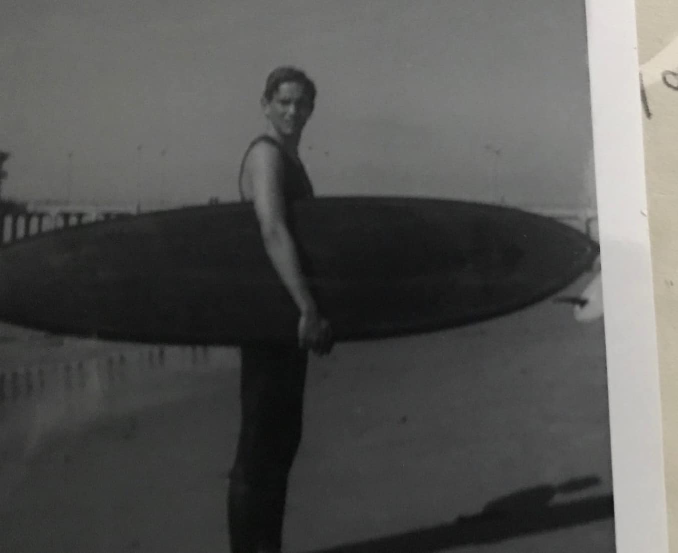 My brother with his plastic fantastic surfboard, probably around