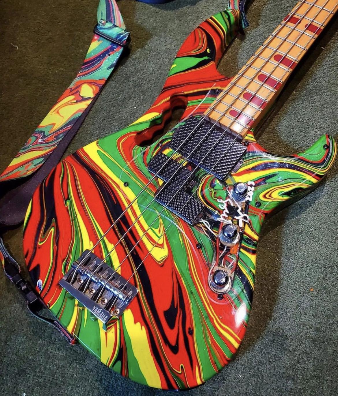 Yamaha Attitude basses customized with Monkey Grip and swirl paint