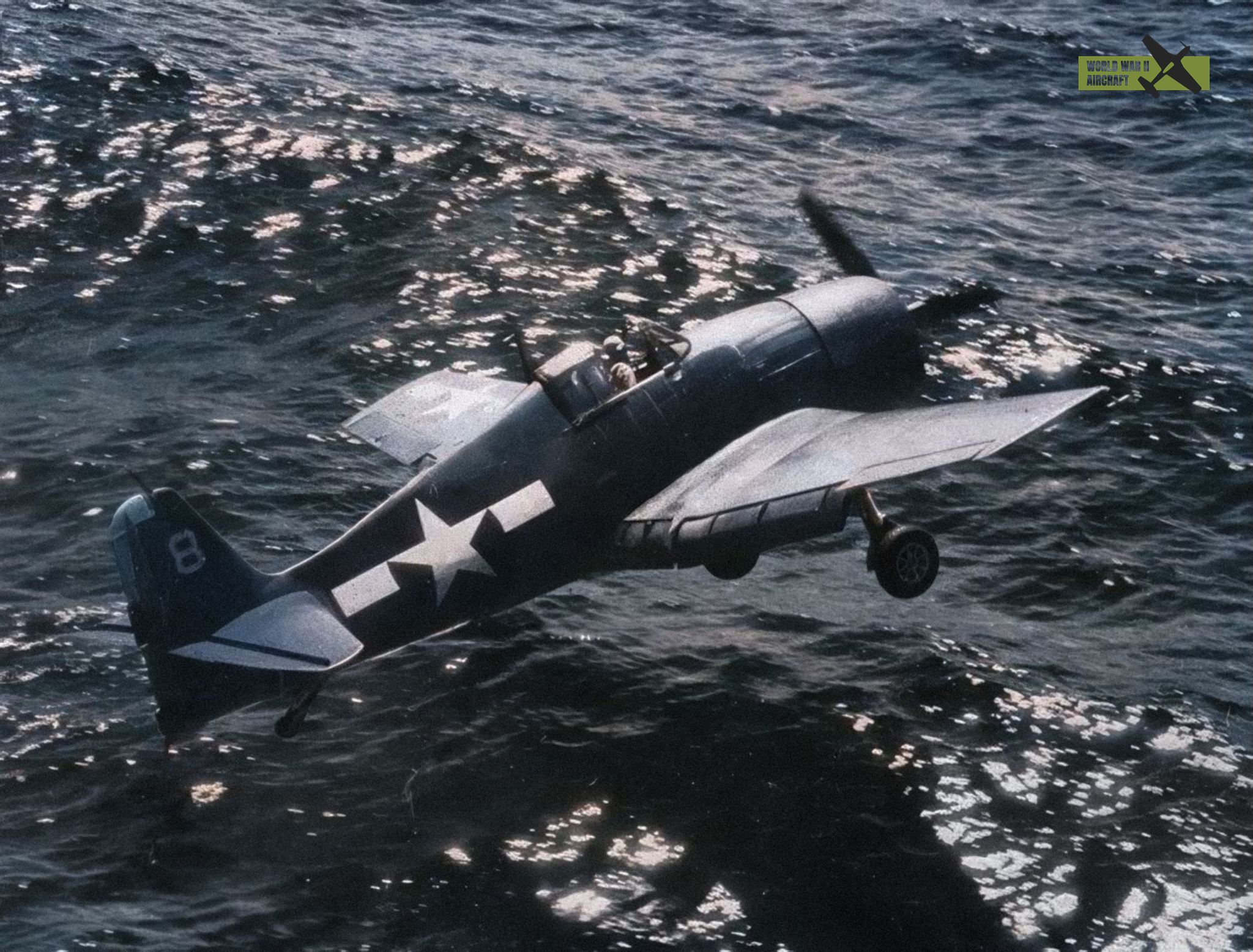 F6F Hellcat #8 of the VF-17, USS Hancock lands on water July 6, 1944.