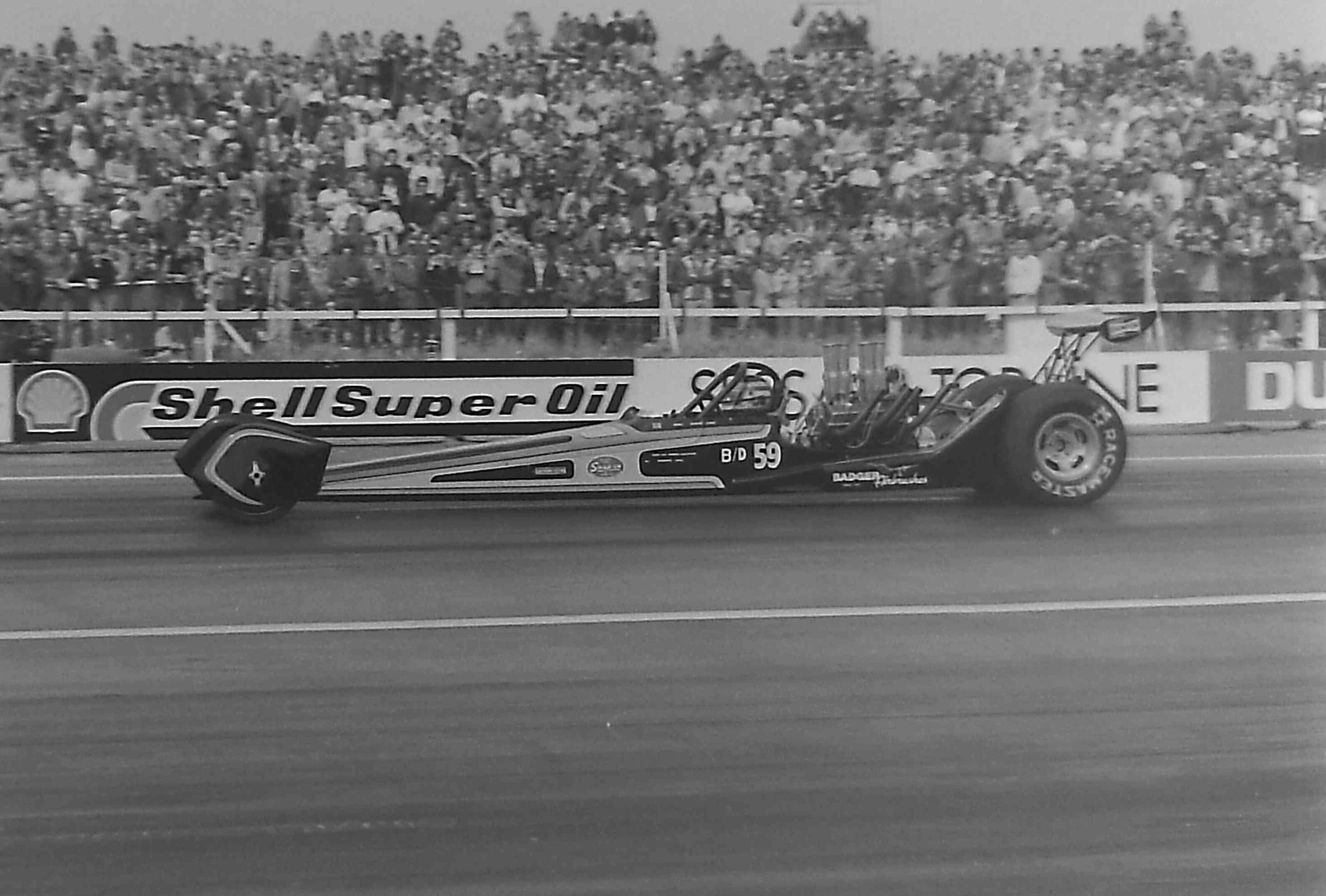 Peter Crane driving Hustler Chevy Vega in 1980