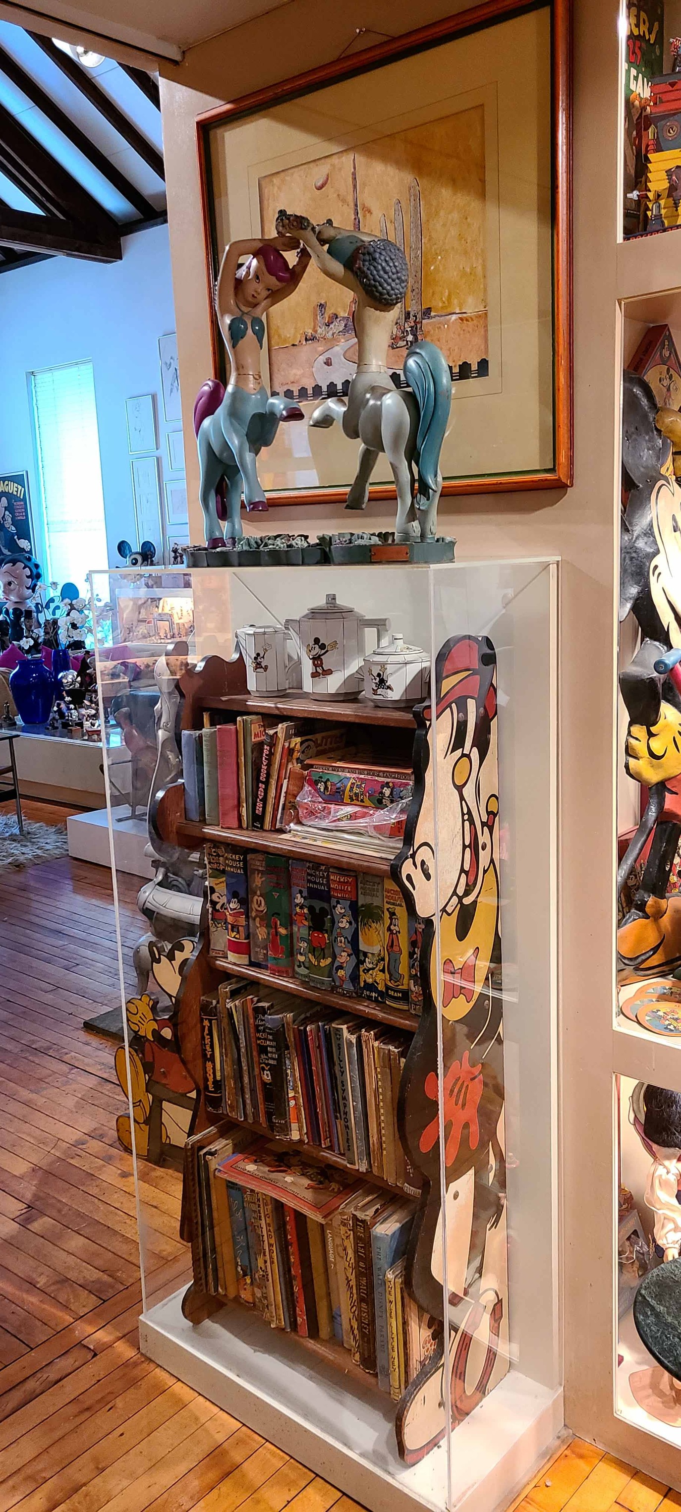 Vintage Disney bookcase and English Annuals collection