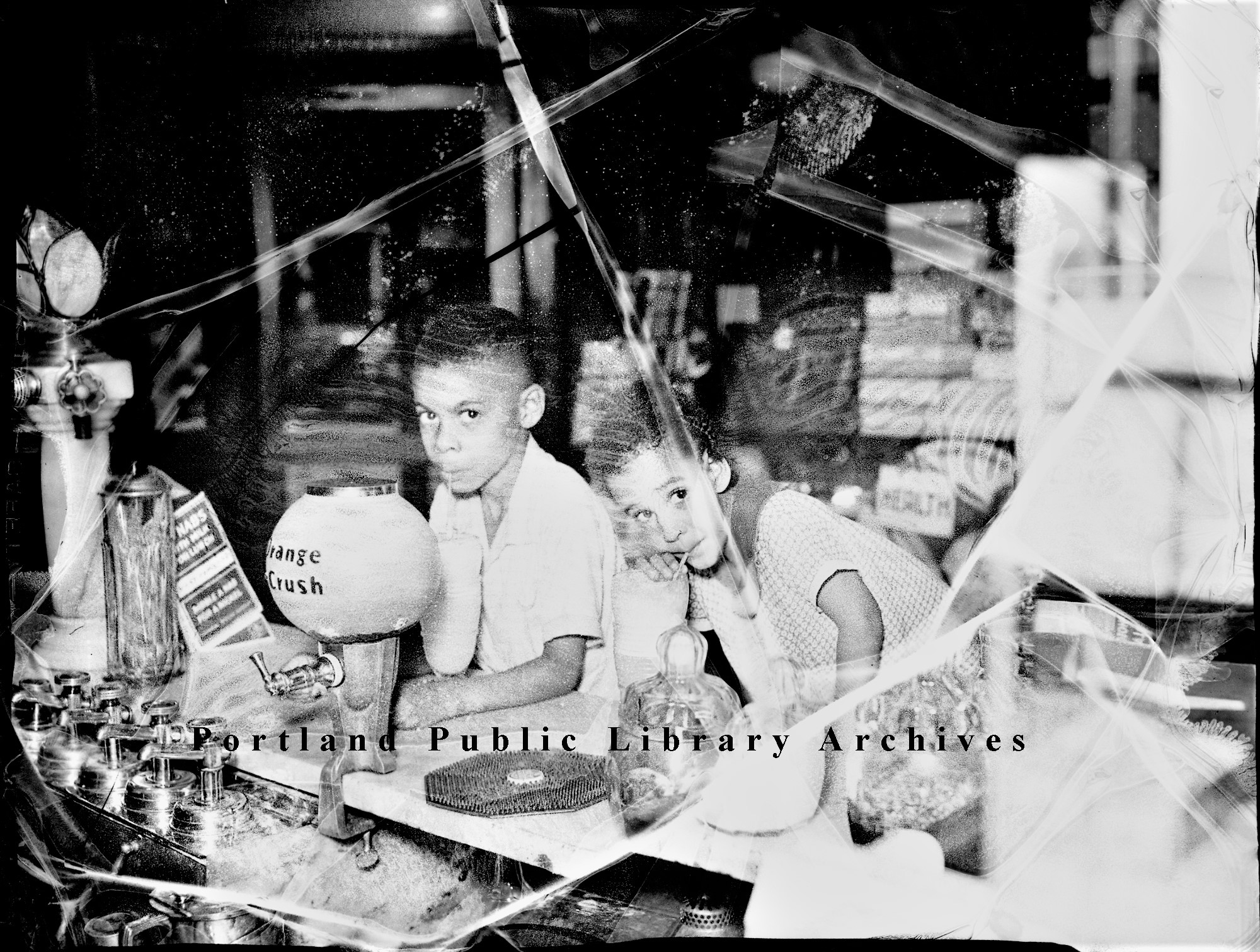 Interior view of a local drug store soda fountain, circa late 
