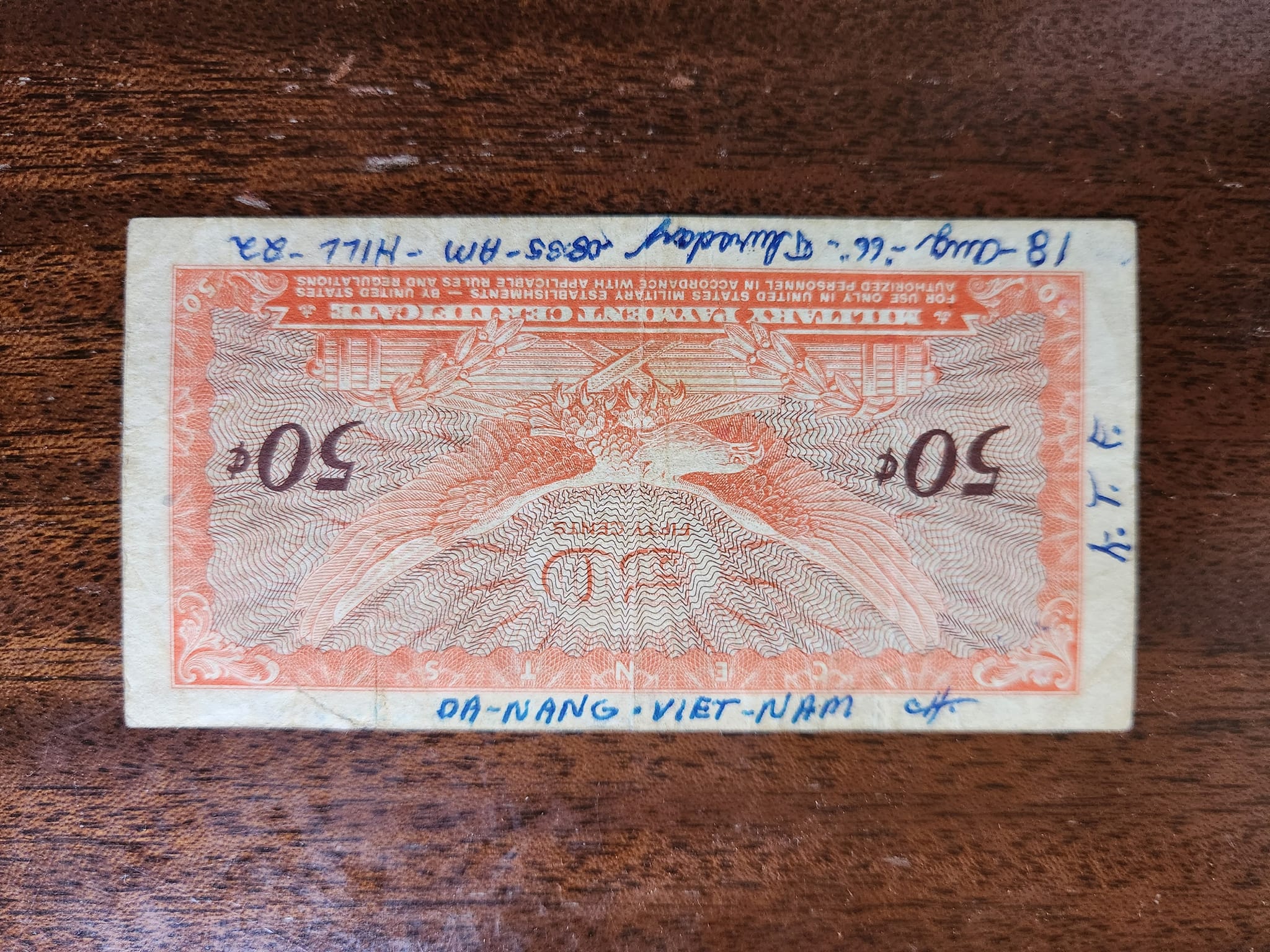 What is the significance of the handwritten notes on the back of a 