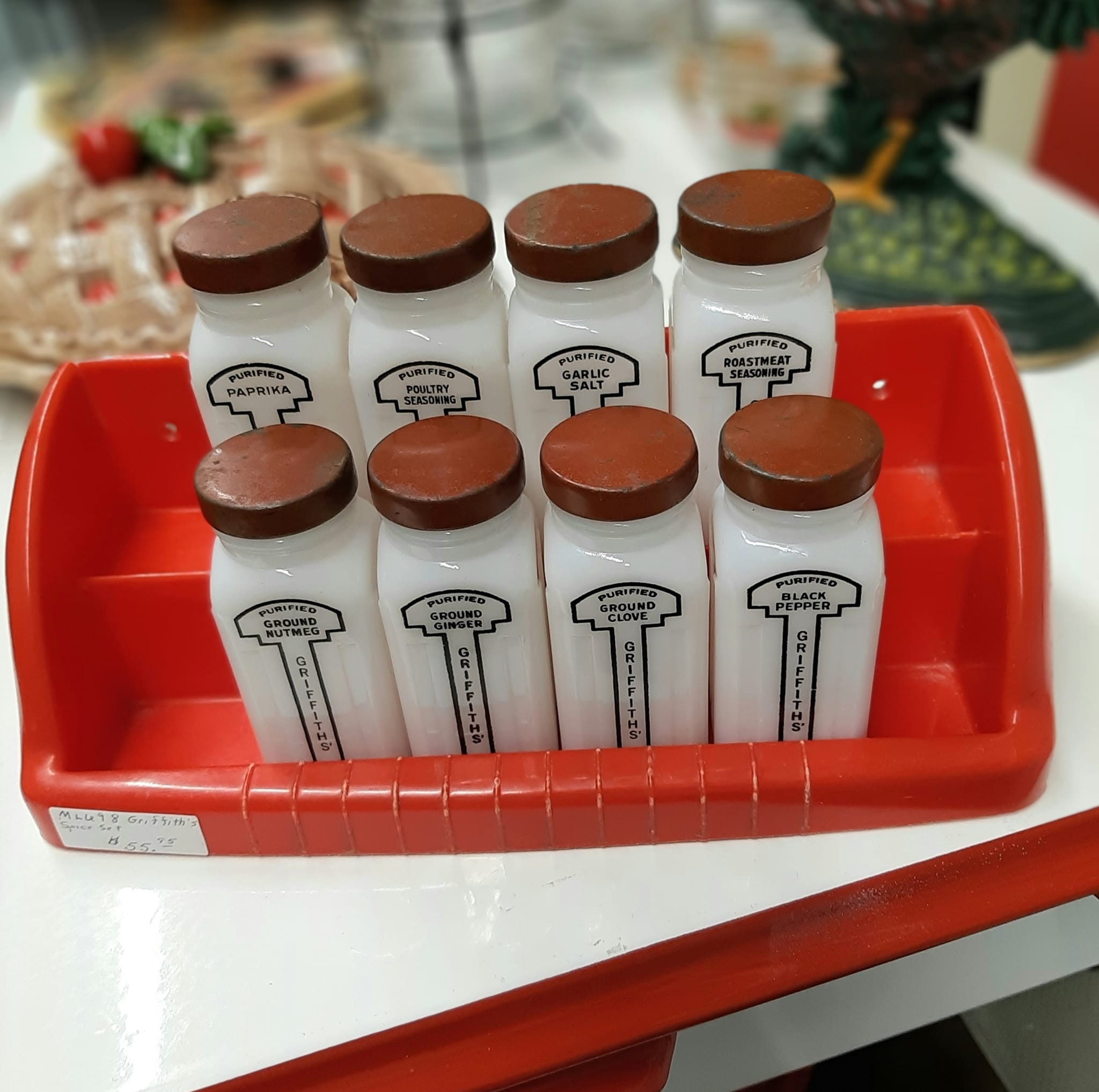 Vintage Griffith milk glass spice jars with wooden rack
