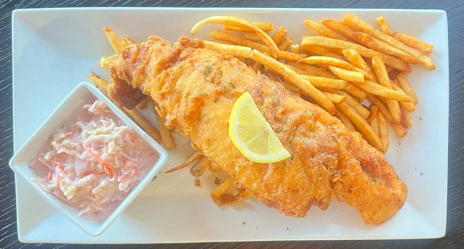 Rabbit - Savor a delicious fried fish with crisp fries and creamy ...