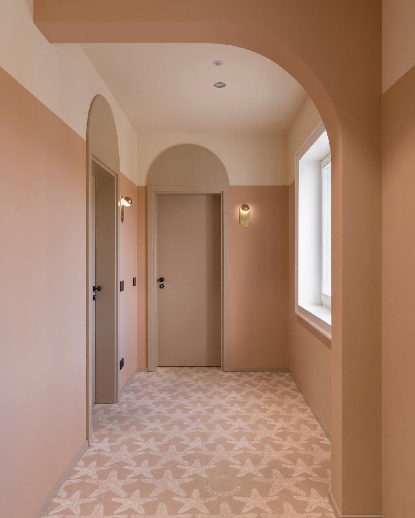 1/4 halways of @grand_koper hotel. they all follow the tertacota