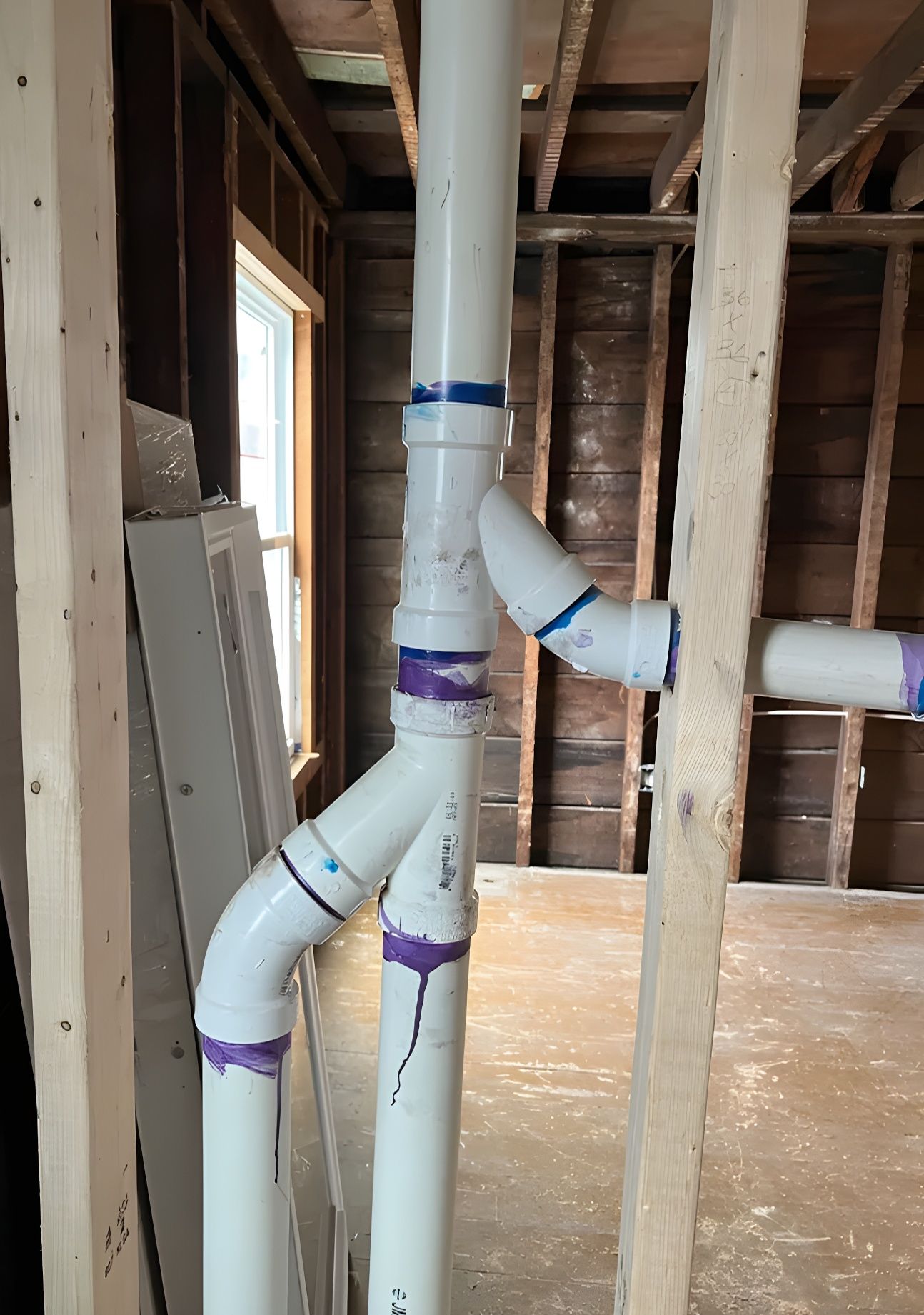 How its Works | A section of newly installed PVC plumbing within the ...