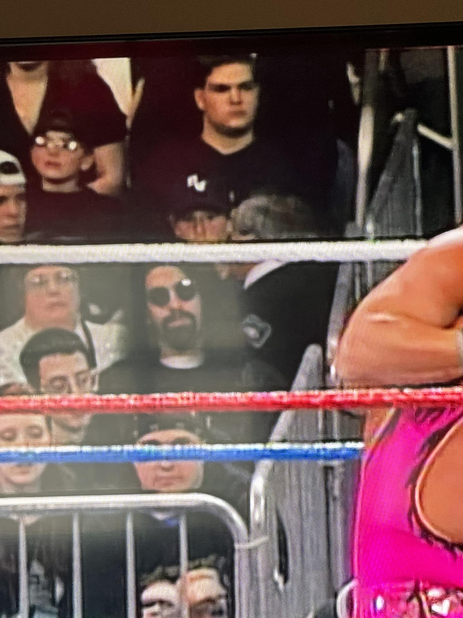 Who is the guy in shades at WWE and ECW shows in the 90s?