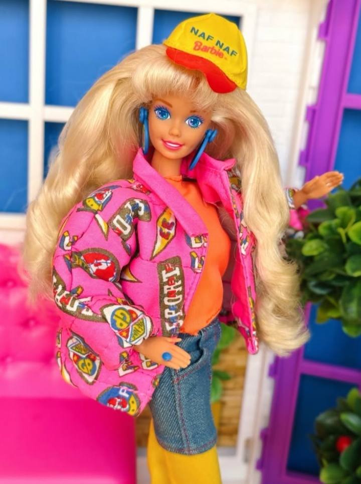 Naf Naf Barbie (1993) is rocking the bold pink, electric yellow