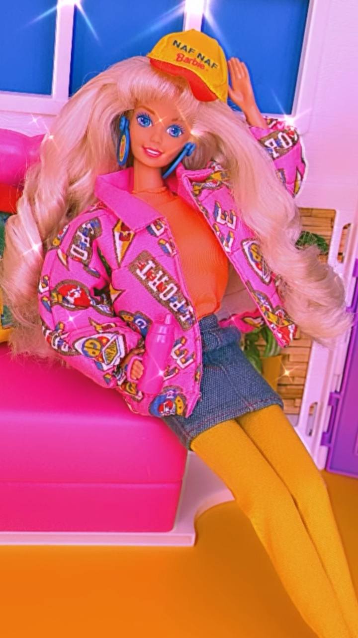 Naf Naf Barbie (1993) is rocking the bold pink, electric yellow