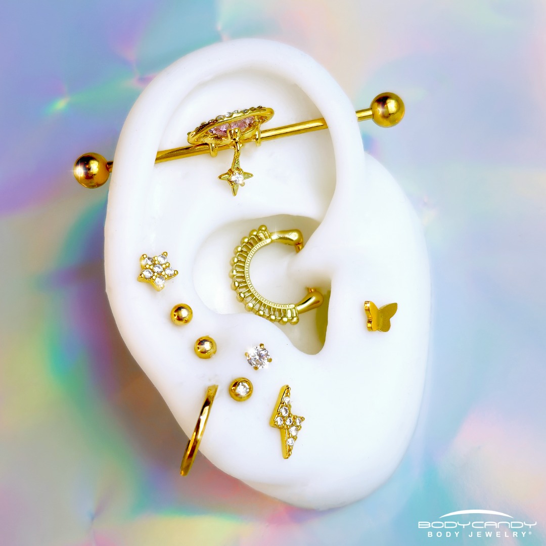 AMBUSH® original branded pill charms are suspended from an