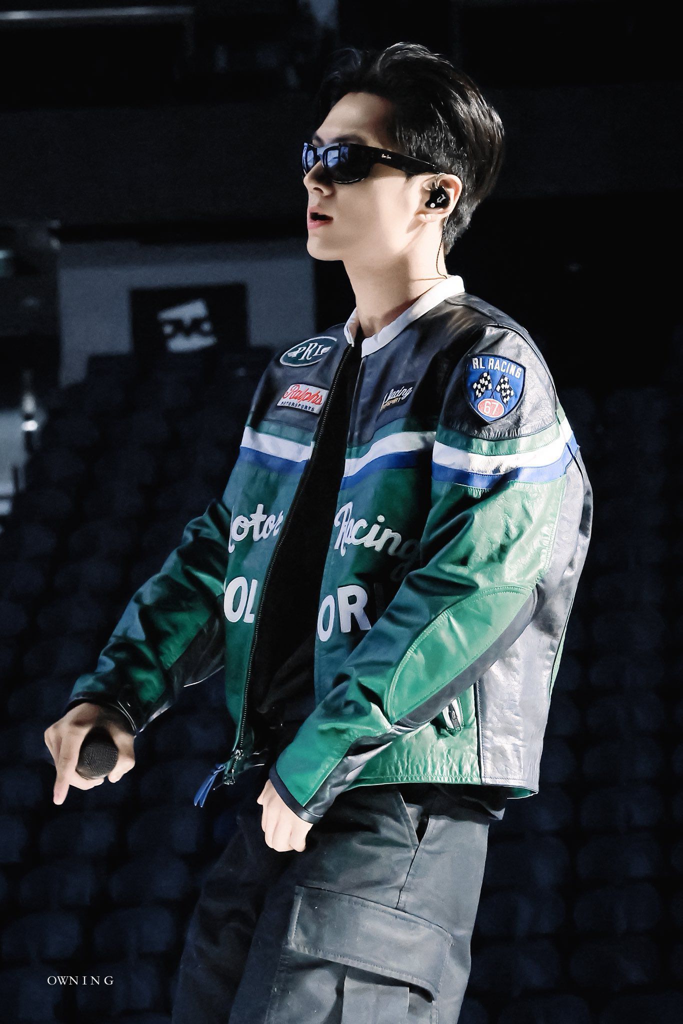 jay with his undercut, in specs, and wearing a ralph lauren jacket 