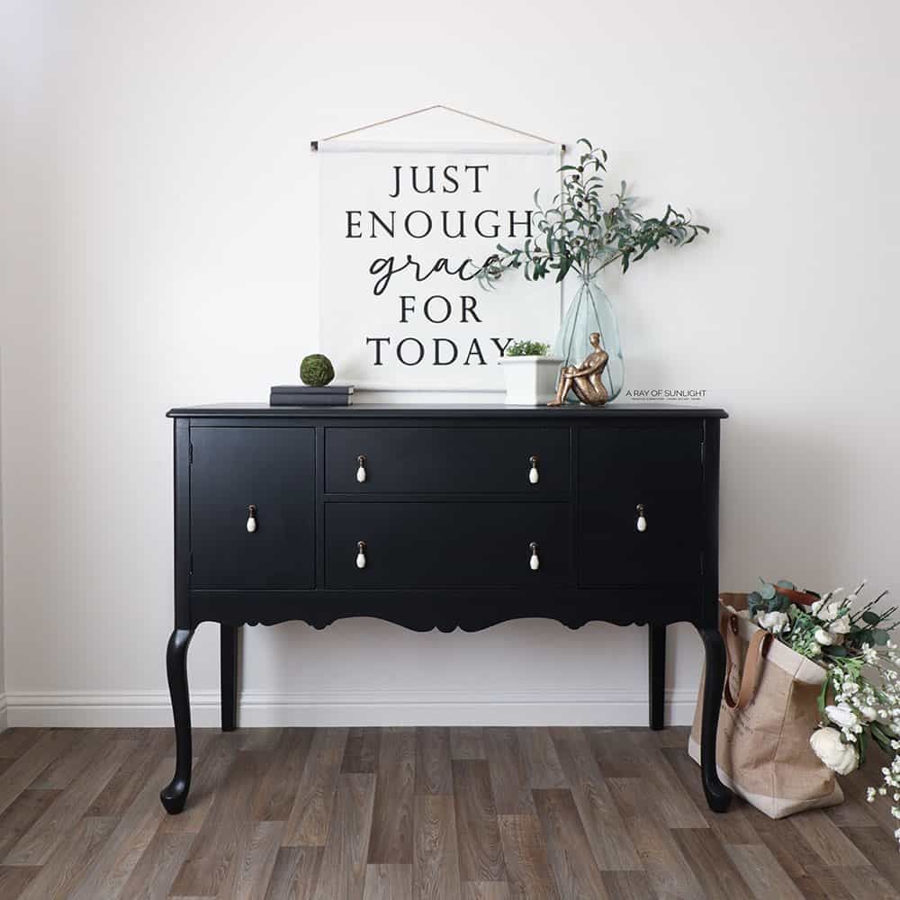 Do you think the hardware change was a smart move for this black buffet makeover! Get the details here: ➡ https://arayofsunlight.com/chalk-painting- furniture-black