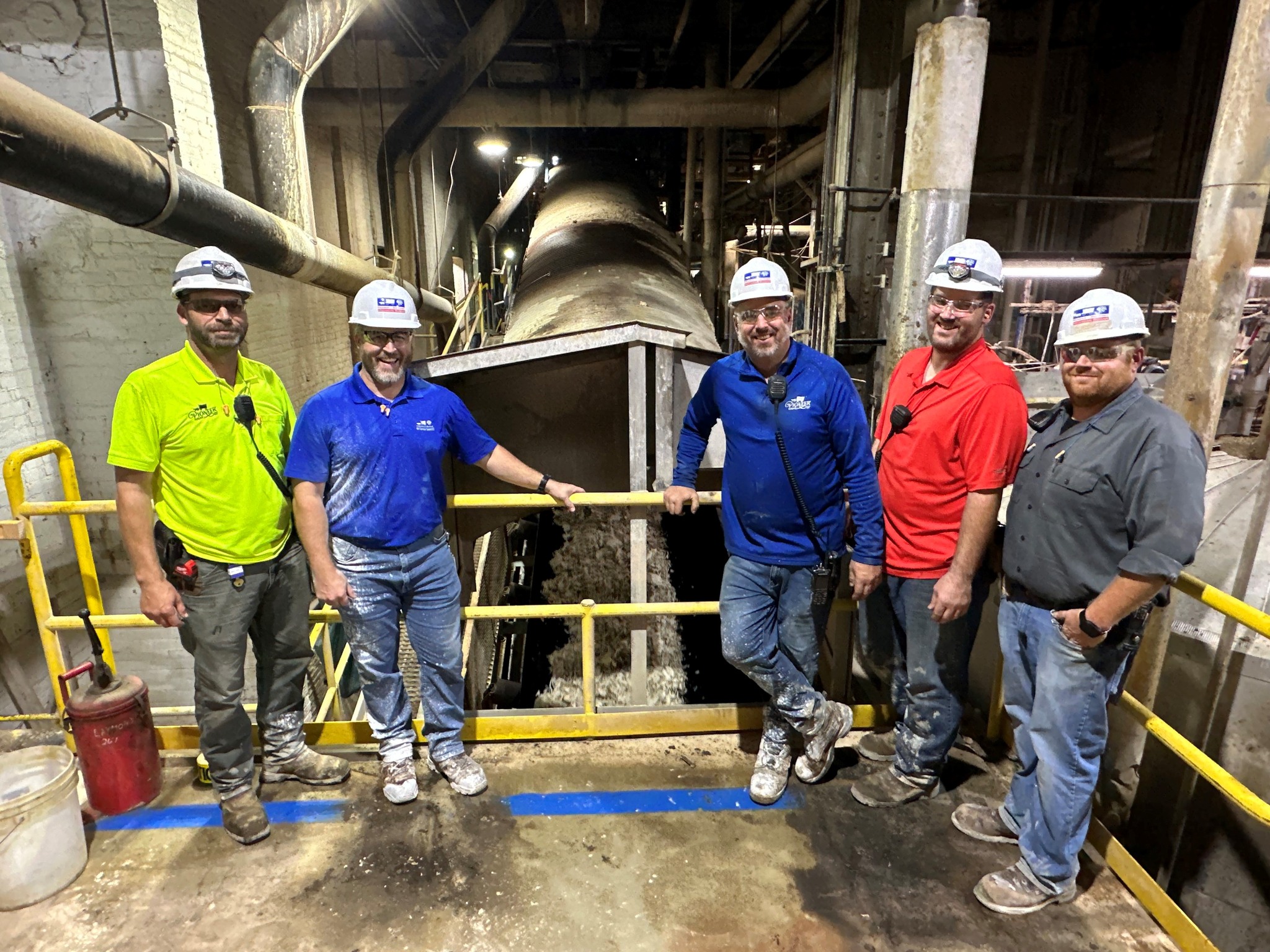 Michigan - Bay City Factory Manager Jason Kain, second from left, with ...