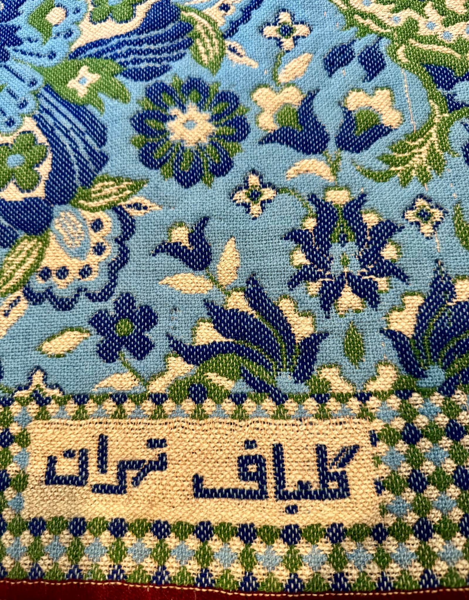 A vintage rug/tapestry by the artist “Tere” Teresa Gonzalez, found