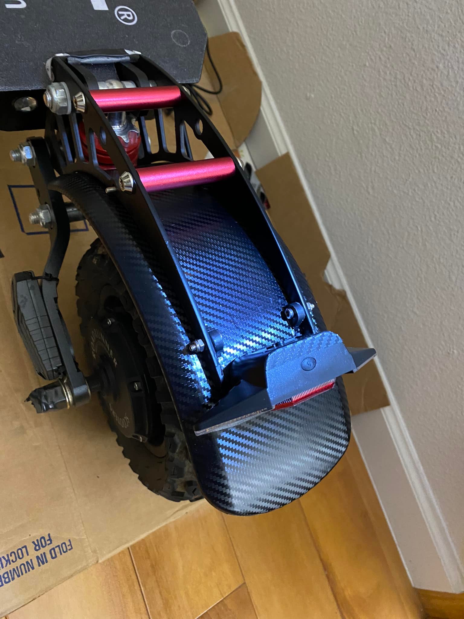 Rewrapped rear fender in high-quality carbon fiber
