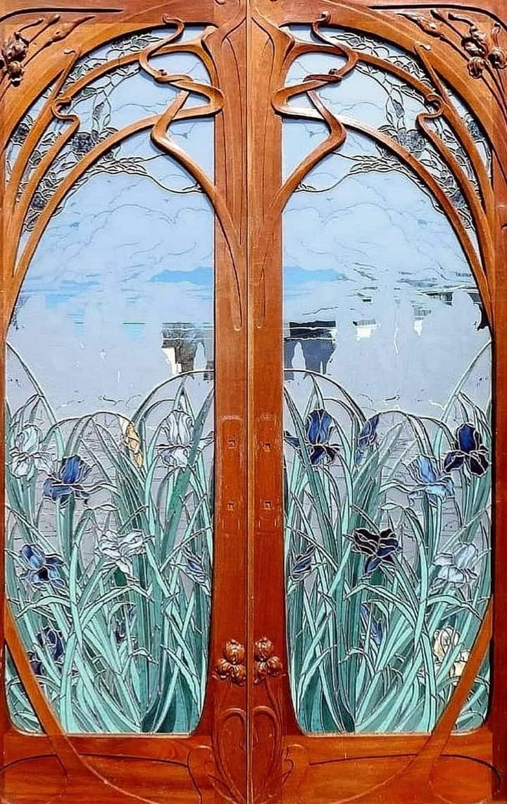 Art Nouveau mahogany entry door with stained glass by Eugene Gaillard