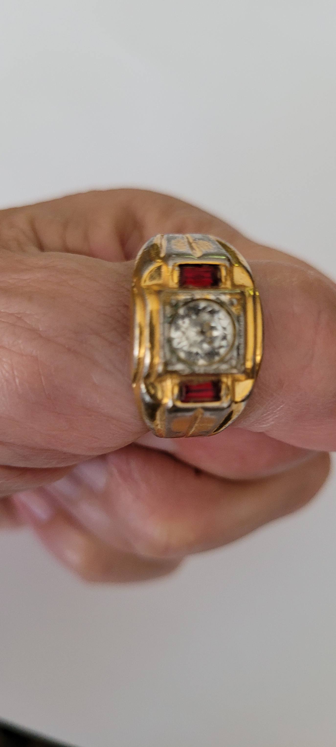 What is the meaning of 14Kt G.E ESPO on a ring?