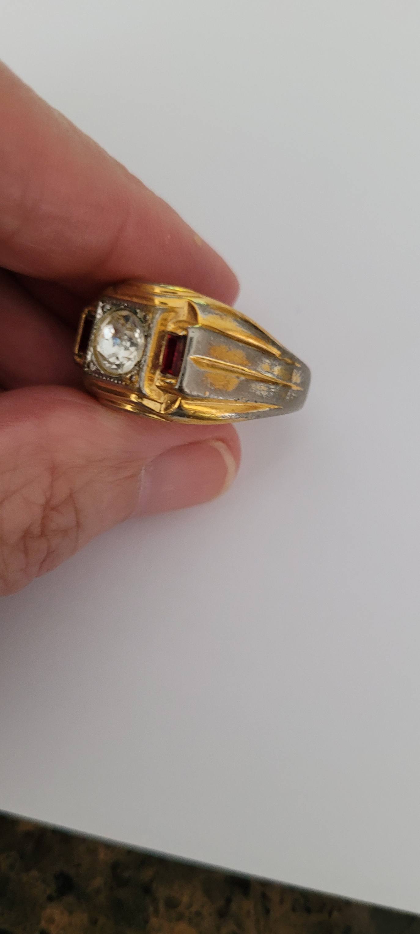 What is the meaning of 14Kt G.E ESPO on a ring?