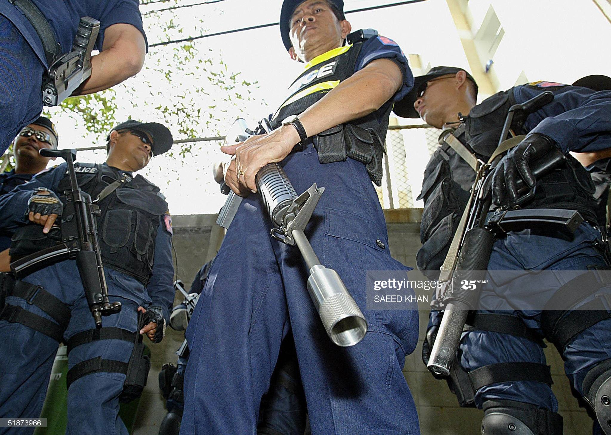 S21K - BANGKOK, THAILAND: Thai special security officers take their ...