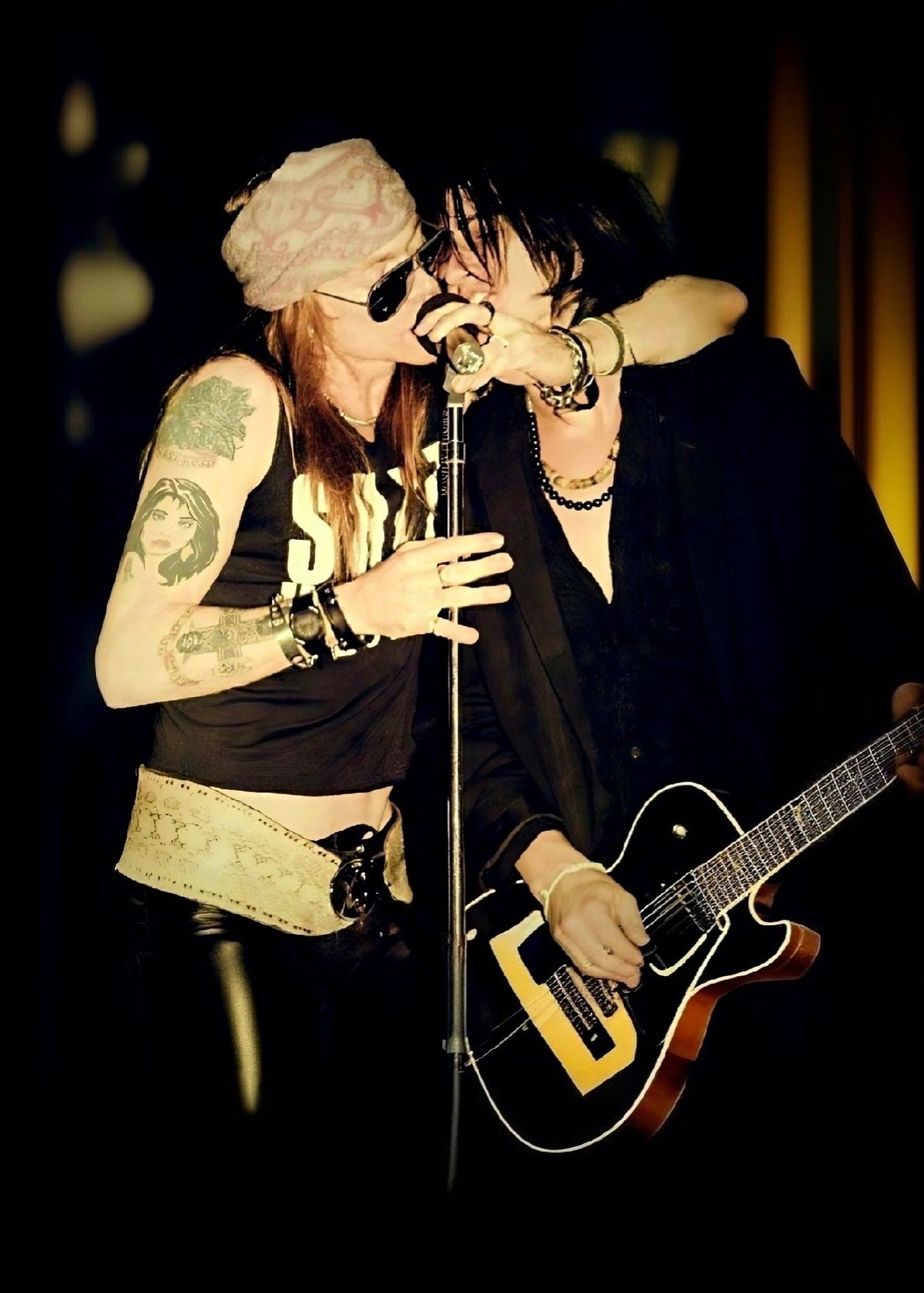 Gilby Clarke with his band Candy and his friend Izzy Stradlin