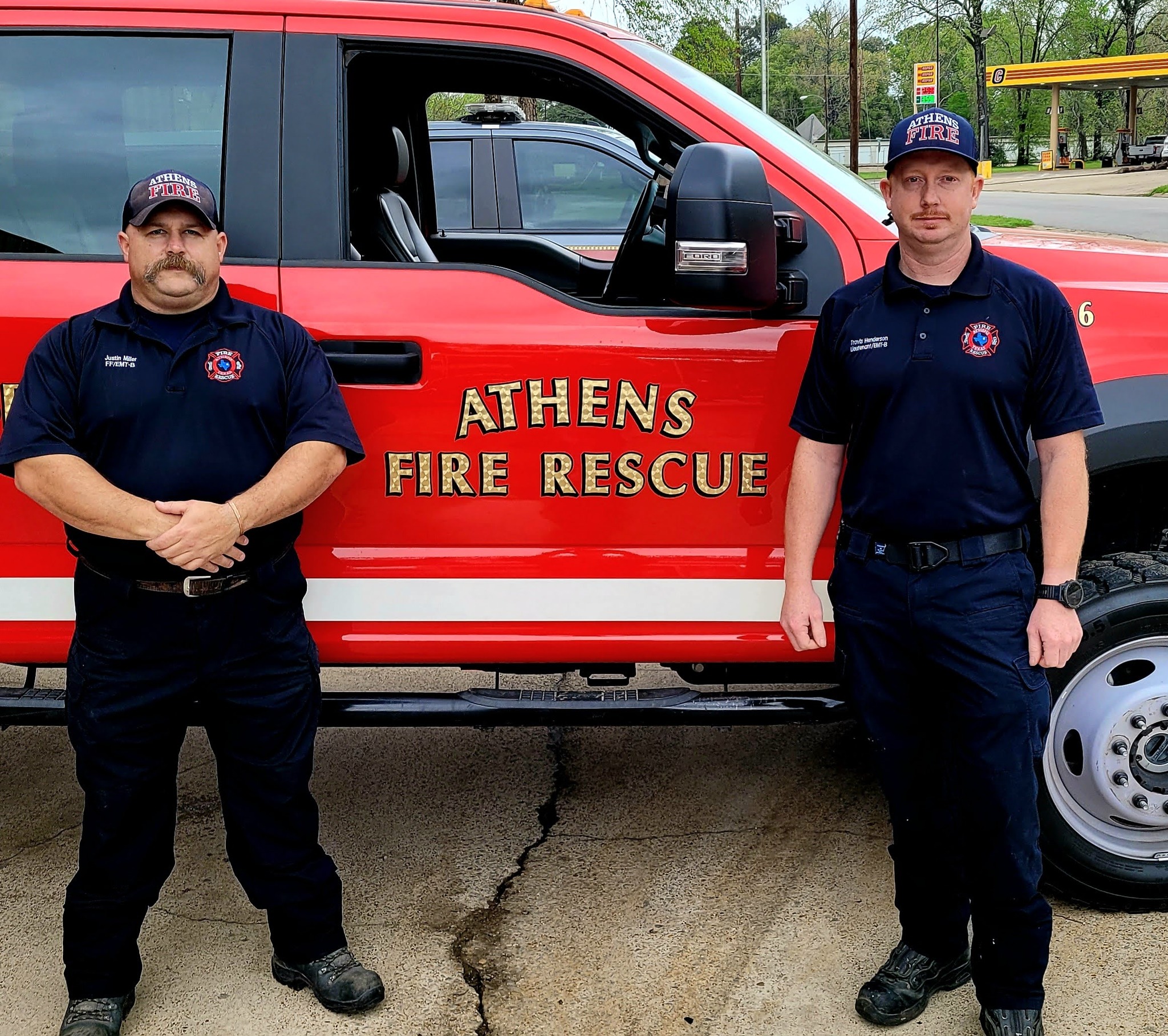 Athens - Lt. Travis Henderson (right) and Firefighter Justin Miller of ...