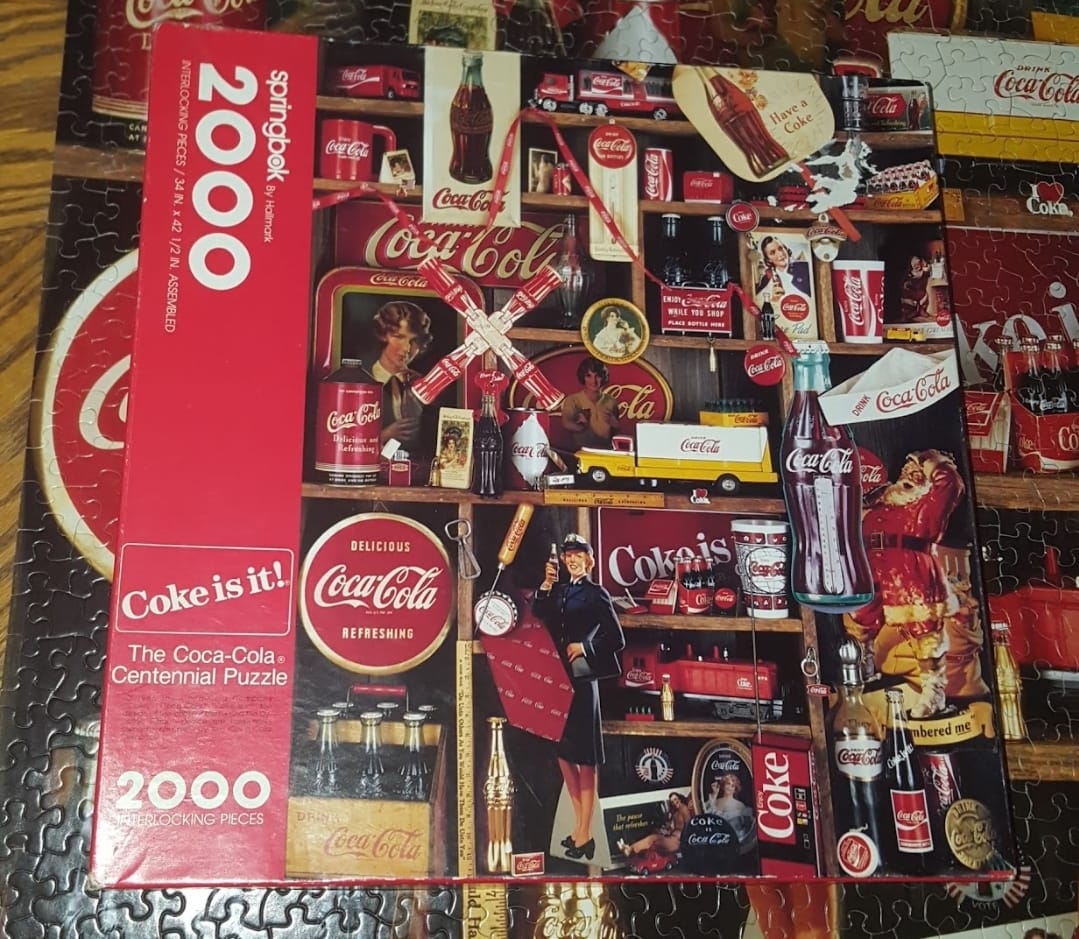 Completed 2000 piece Coca Cola centennial puzzle