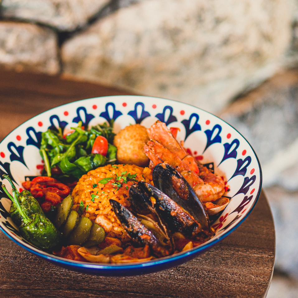 Our Spanish rice bowl with... - Cava Restaurant and Bar | Facebook