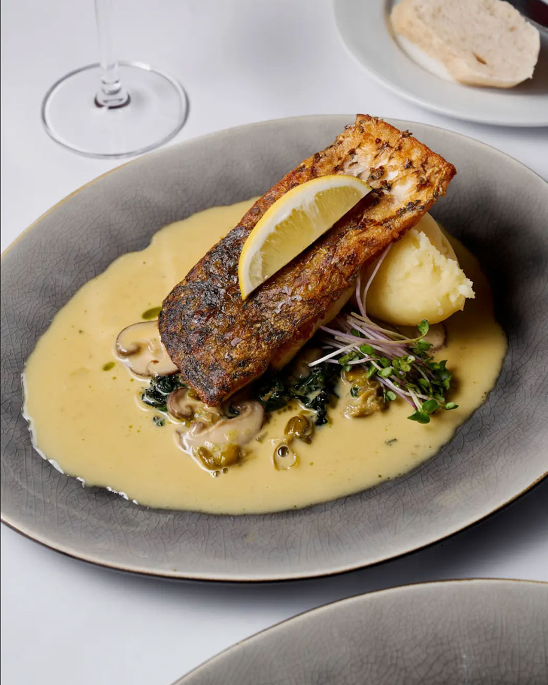 HOUSE - Our Asian Sea Bass comes in a velvety shrimp confit sauce ...