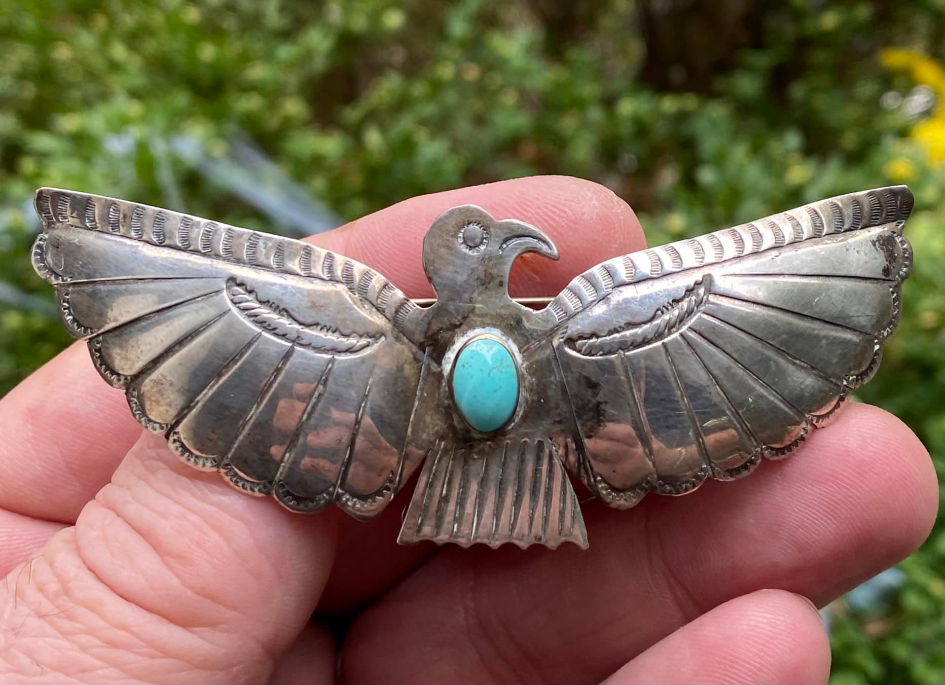 Vintage handmade sterling silver thunderbird pin