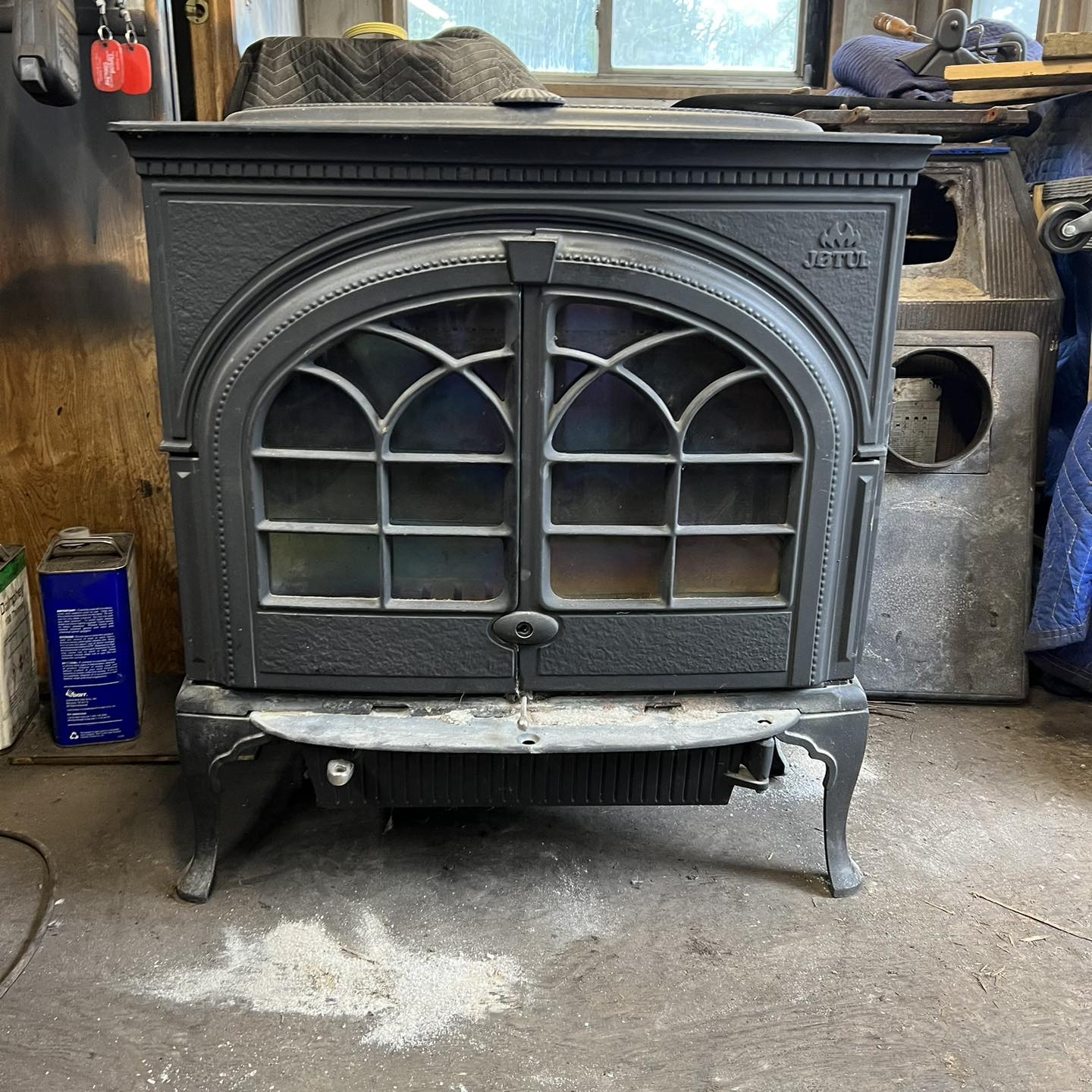 Restored Jotul F600 wood stove before and after