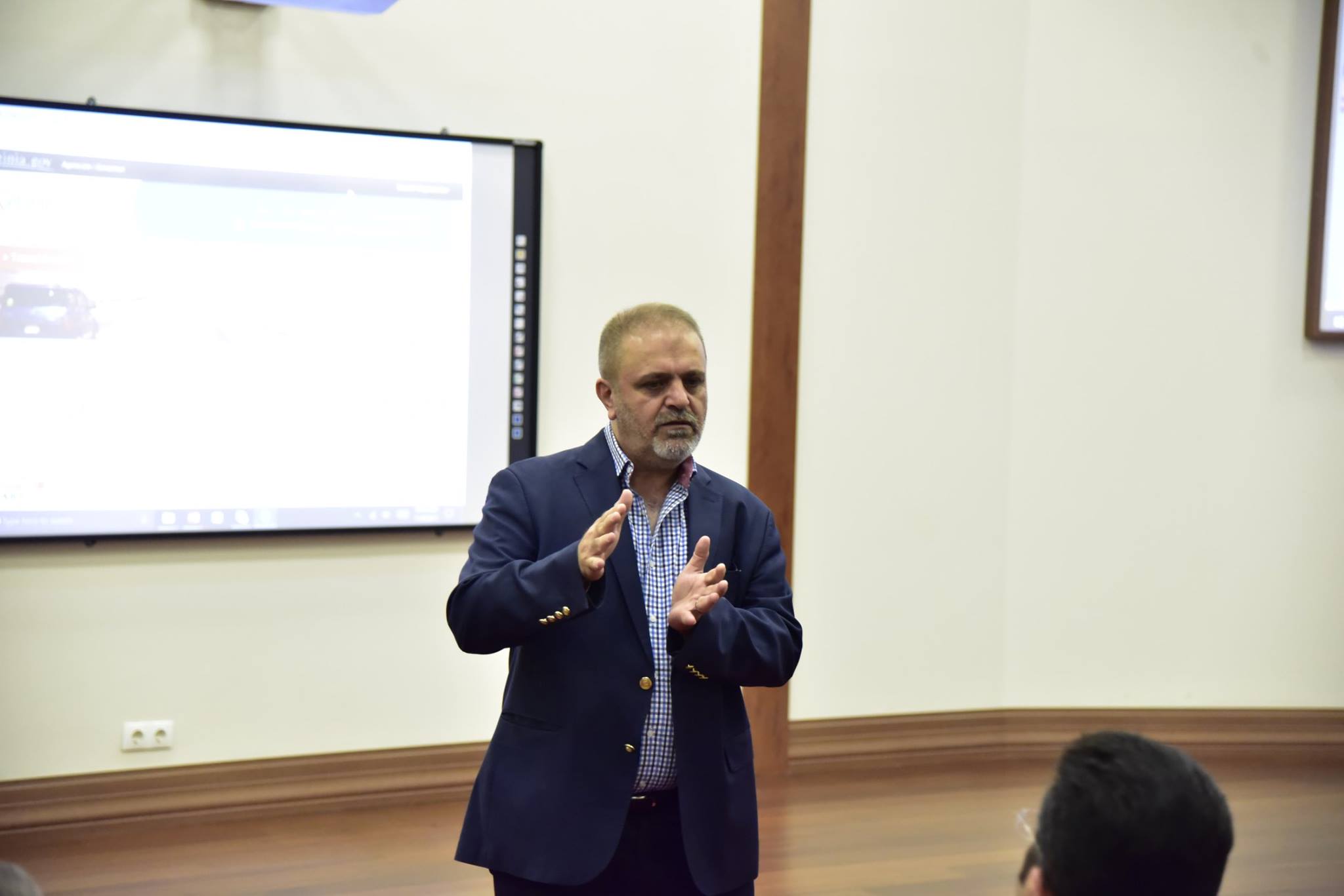 Dr. Razaq Ferhadi,... - The American University of Kurdistan
