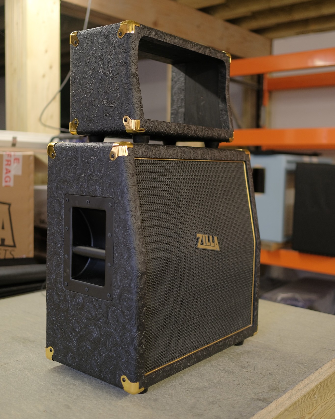 Ported 1x12 in black western tolex with oxblood grill.