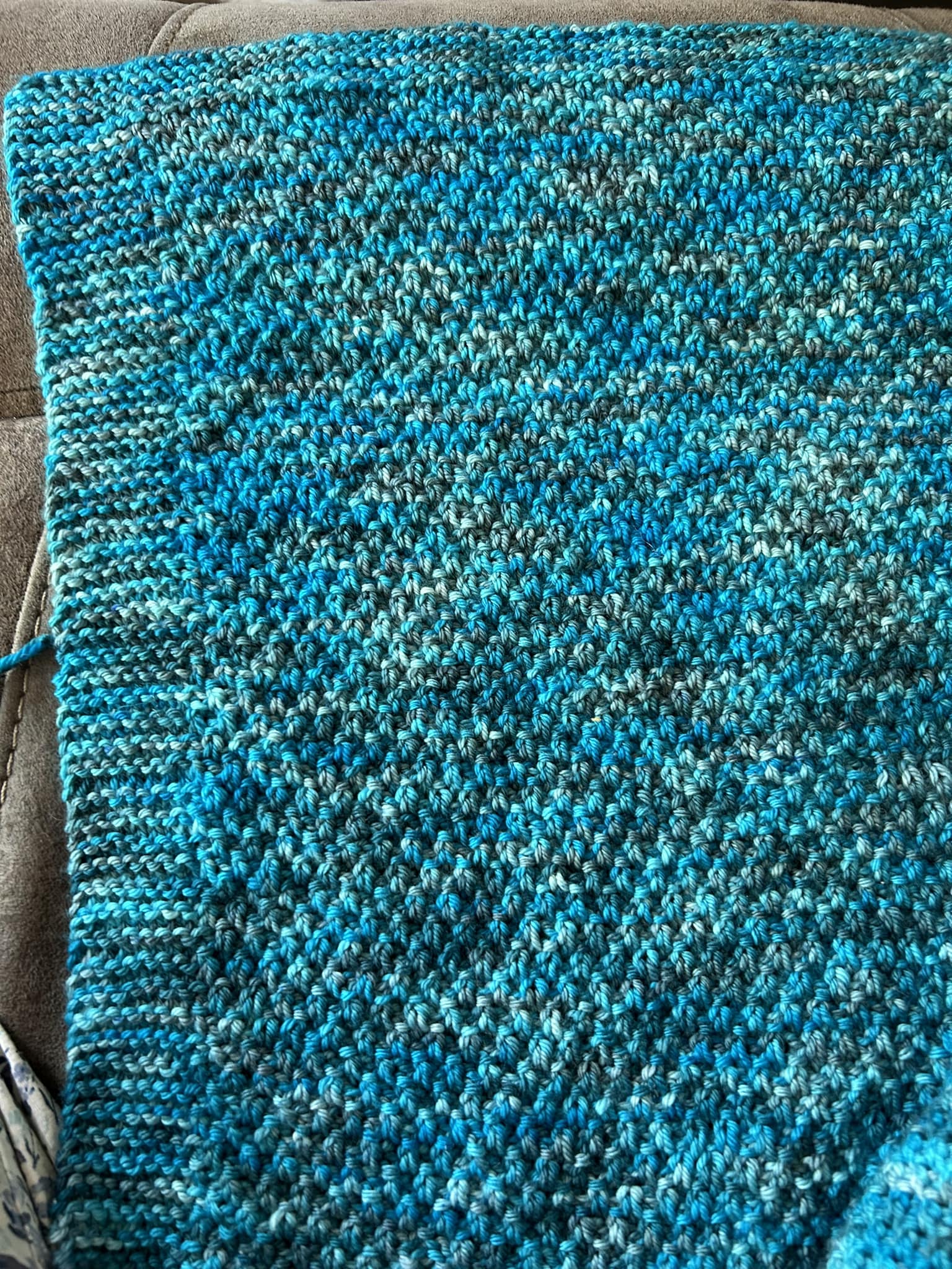 How to add a wider border to a knitted blanket?