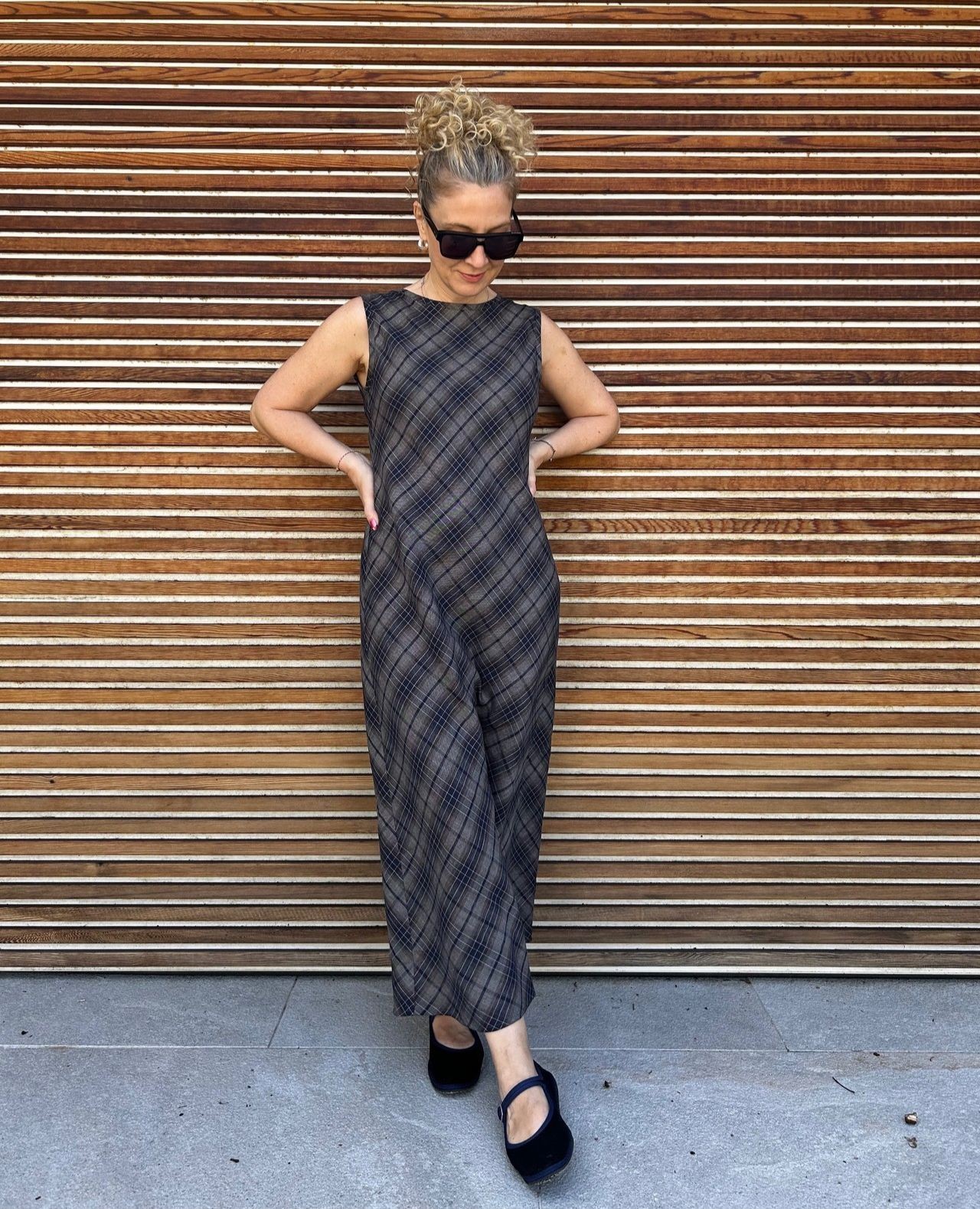 Check Linen Gathers at the waist bring subtle volume and movement 