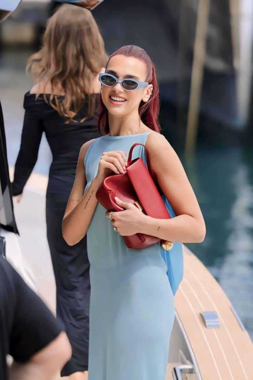 dua lipa jacquemus blue dress attends cruise in Capri Best Sellers NH Week 47