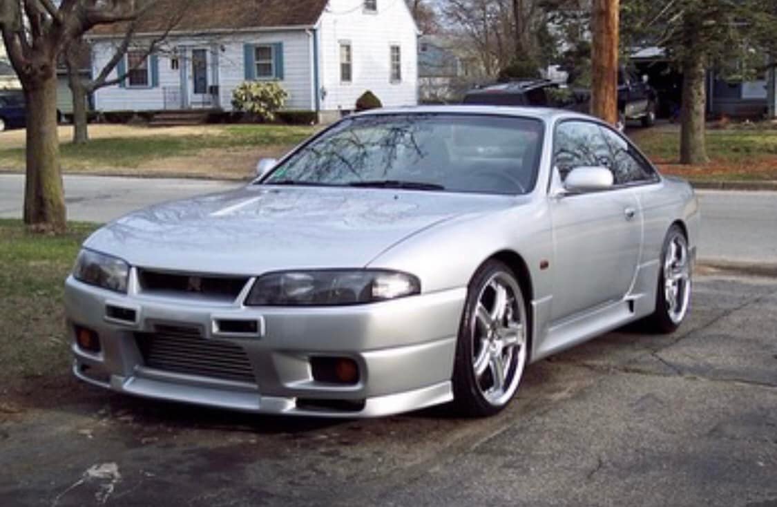 Nissan S14 with an R33 Skyline front end. Pics via carsof00s on