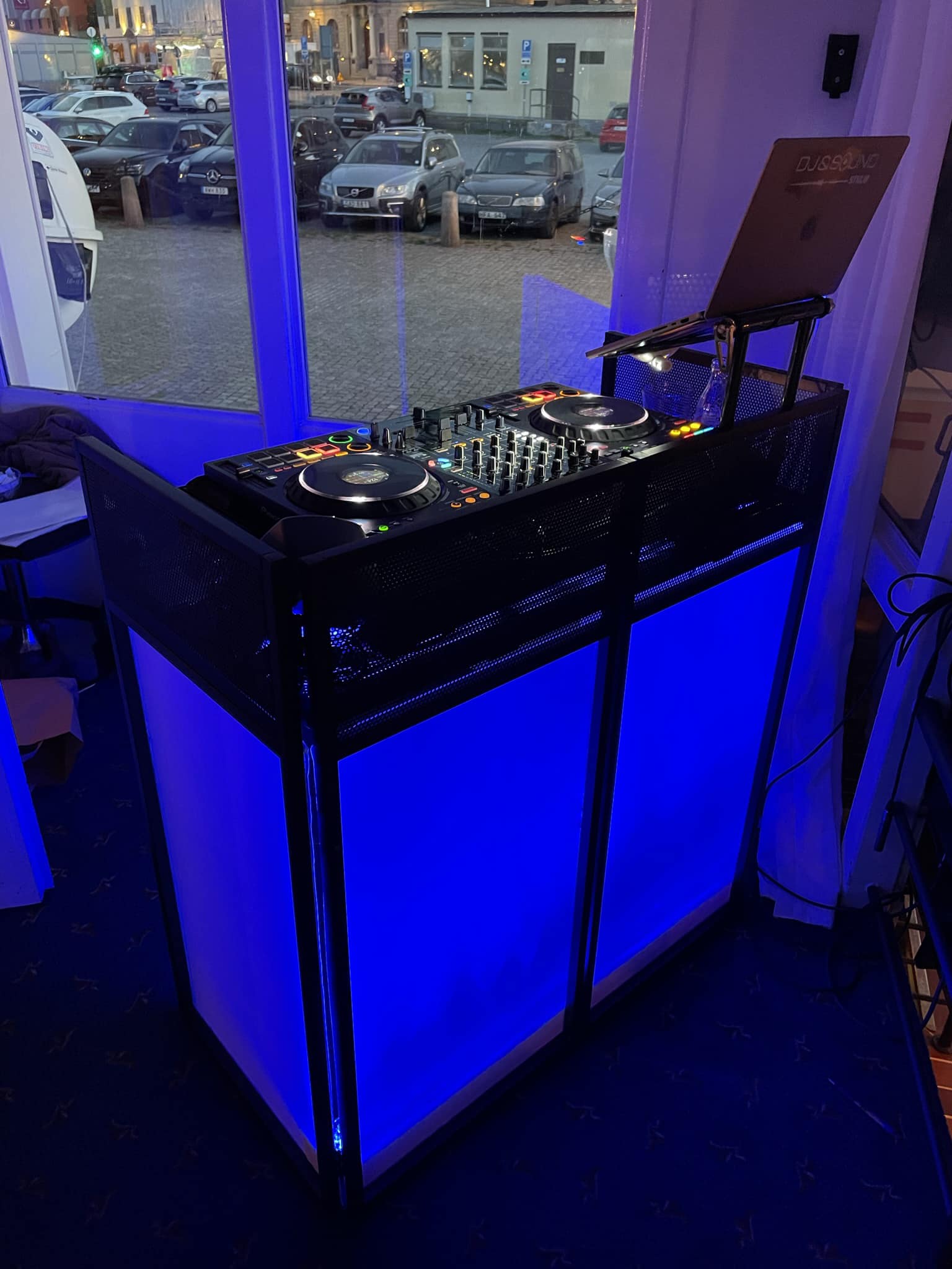 DJ setup with Pioneer FLX-10 and Genelec monitor