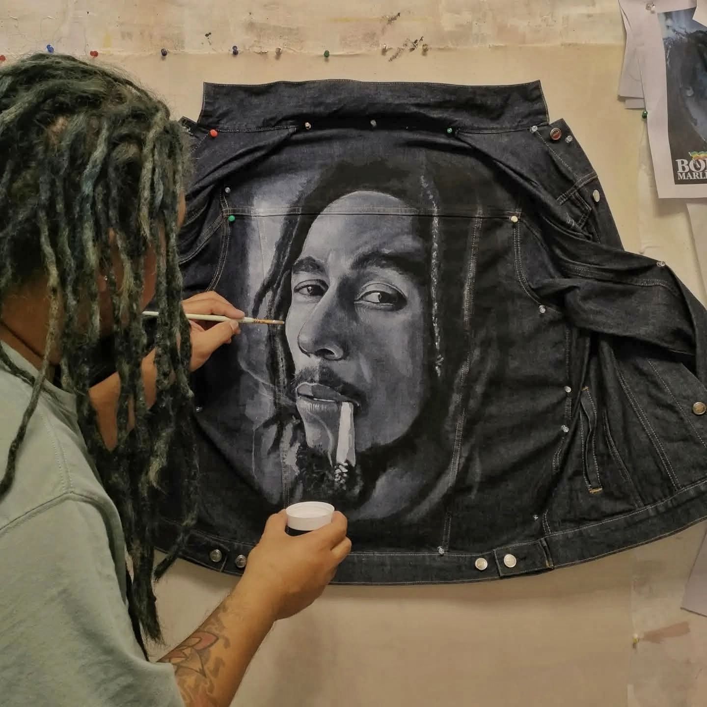 Painted Bob Marley on denim—spreading peace, love, and good vibes 