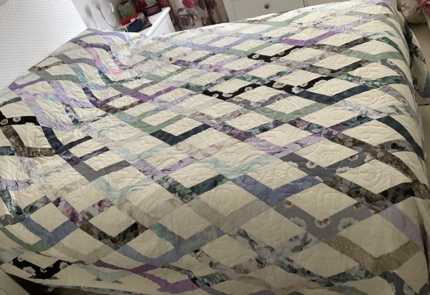 Hanging Gardens quilt with Essence of Pearl purple jelly roll