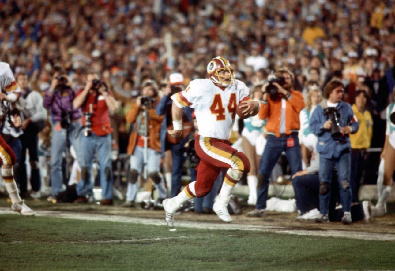 The Red - Washington Redskins running back John Riggins breaks free on ...