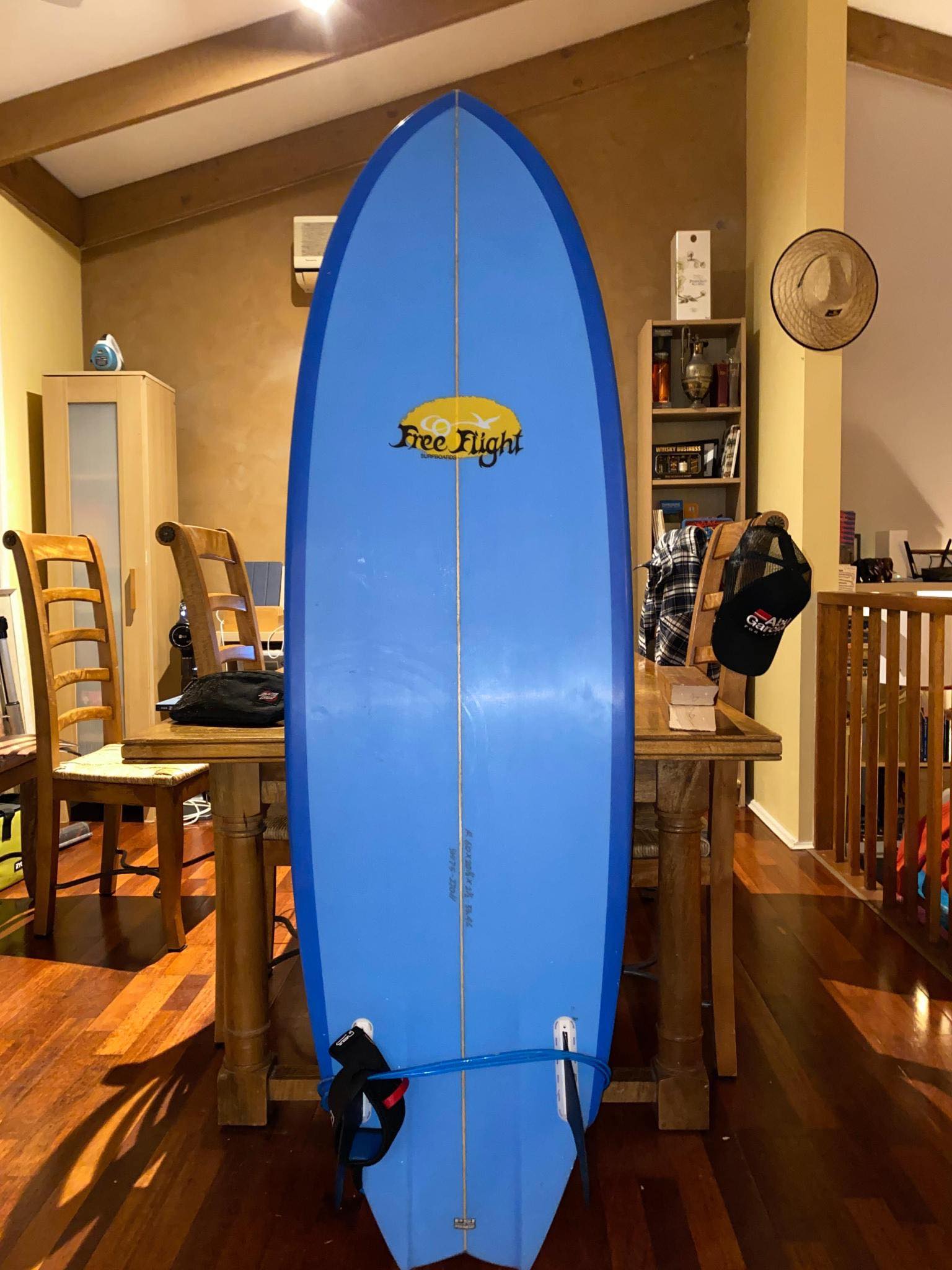 Missing 6'4 Joel Tudor blue single fin surfboard at Seacliff