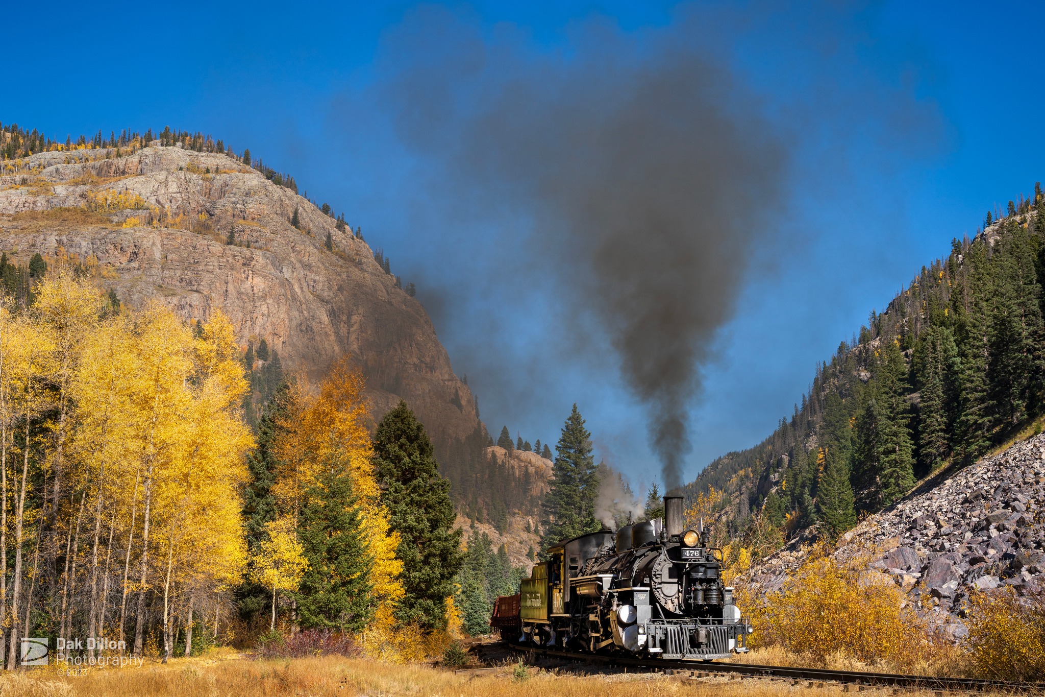 Dak - Durango & Silverton 476 with a freight train in fall color ...